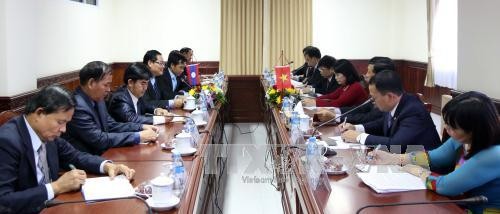 ОФВ и Фронт национального строительства Лаоса договорились активизировать сотрудничество - ảnh 1